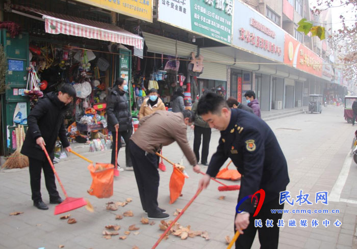 县城市管理局：开展机关党组织党员“双报到”暨法治政府建设送法进社区活动